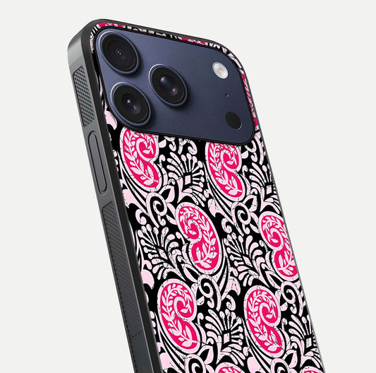 Crimson Paisley Charm Glass Case for iPhone 17 Pro close-up highlighting fine pattern detail and reflection tone