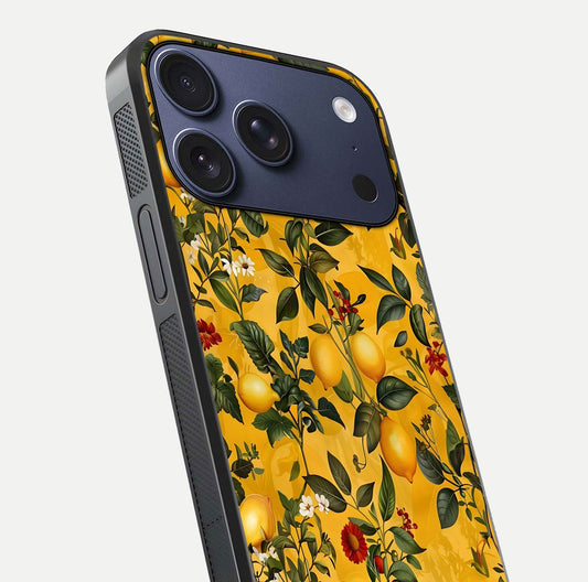 Golden Lemon Field Glass Case for iPhone 17 Pro close-up angled shot showing citrus texture and reflection brilliance