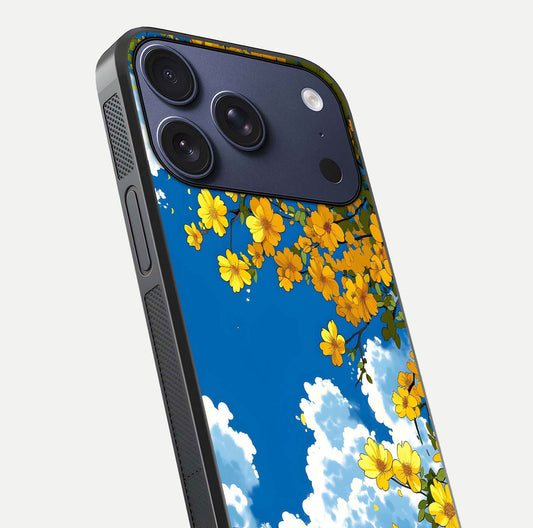 Golden Petal Sky Glass Case for iPhone 17 Pro close-up angled shot showing petal texture and shine reflection