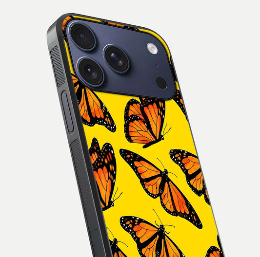 Golden Wing Flight Glass Case for iPhone 17 Pro close-up angled shot showing metallic wing texture and shine detail
