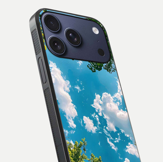 Greenery Sky Glass Case for iPhone 17 Pro close-up angled shot showing leafy tones and reflection brightness