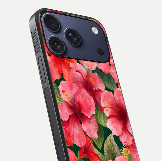 Hibiscus Pattern Glass Case for iPhone 17 Pro close-up angled shot showing flower details and gloss reflection