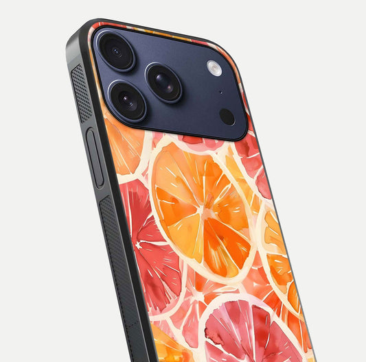 Orange Fruits Pattern Glass Case for iPhone 17 Pro close-up angled shot showing juicy fruit texture and reflection