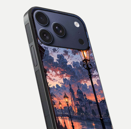 Twilight River Lights Glass Case for iPhone 17 Pro close-up angled shot highlighting river reflections and color tones