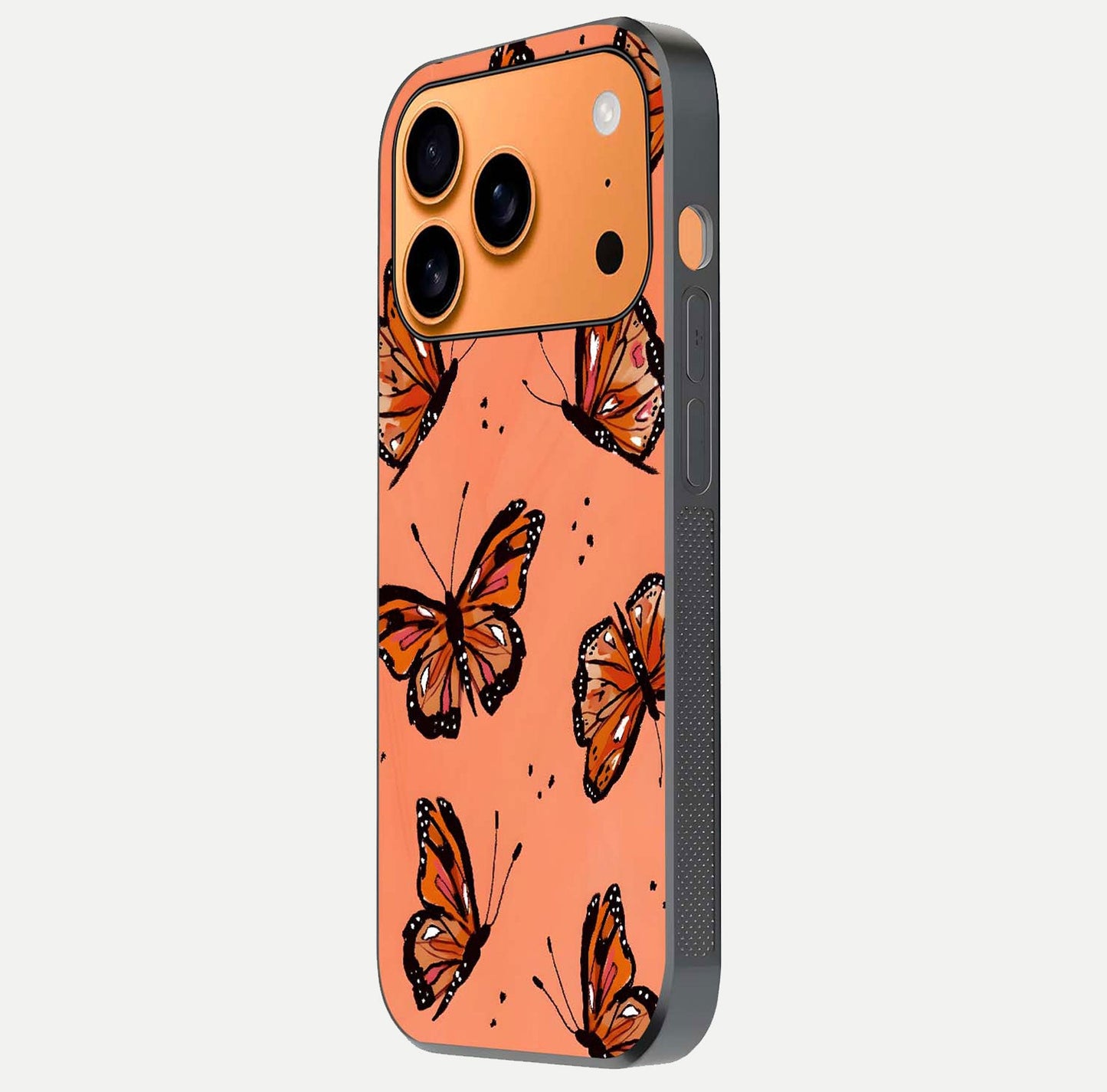 Coral Wing Butterfly Glass Case for iPhone 17 Pro Max side-angle photo showing reflective finish and smooth edges