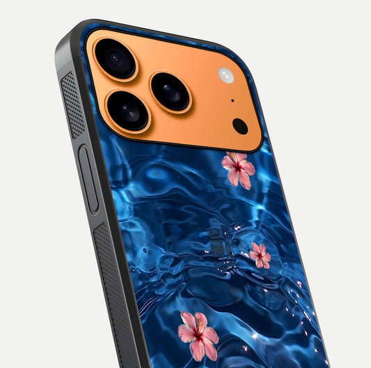 Blooming Water Drift Glass Case for iPhone 17 Pro Max close-up angle showing petal details, soft aqua tones, and smooth gloss reflection