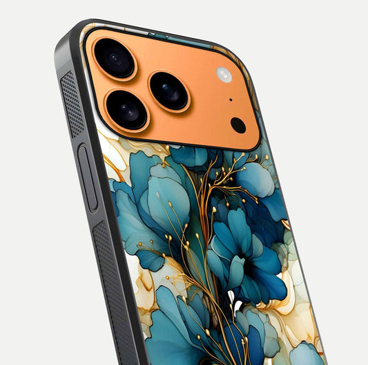 Golden Bloom Symphony Glass Case for iPhone 17 Pro Max close-up angled shot showing detailed petals and metallic gold reflection