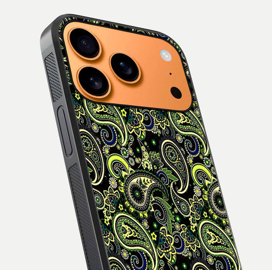 Green Mandala Pattern Glass Case for iPhone 17 Pro Max close-up angled shot showing fine detailing and gold-green reflection