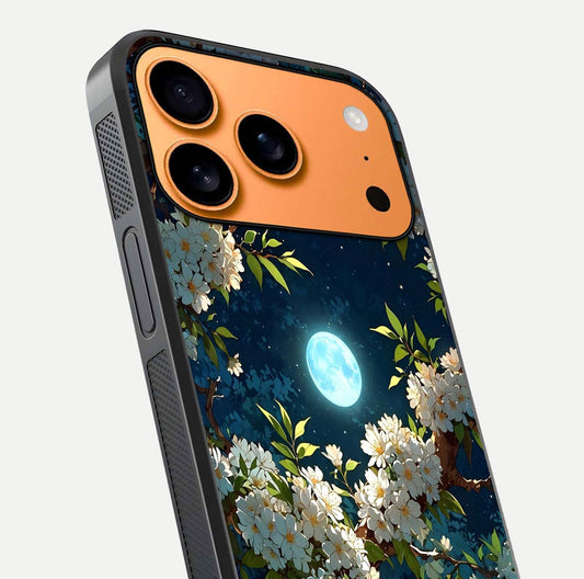 Moonlit Blossom Dream Glass Case for iPhone 17 Pro Max close-up angled shot showing glowing petals and reflection