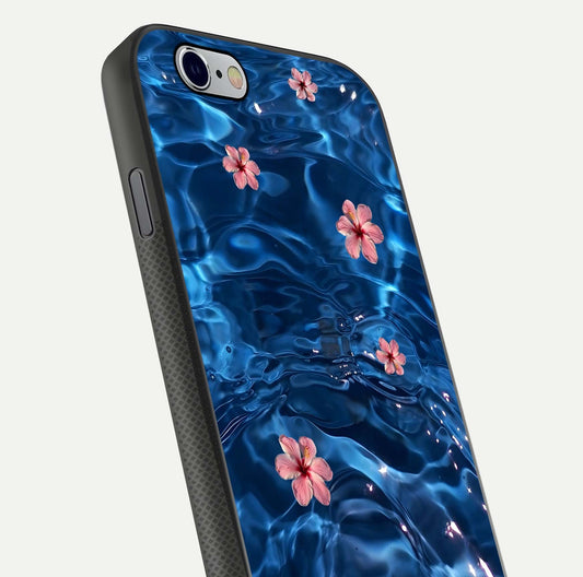 Blooming Water Drift Glass Case for iPhone 16 Pro close-up angle showing petal details, soft aqua tones, and smooth gloss reflection