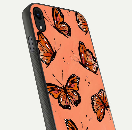 Coral Wing Butterfly Glass Case for iPhone X close-up highlighting wing pattern, coral tones, and reflection shine