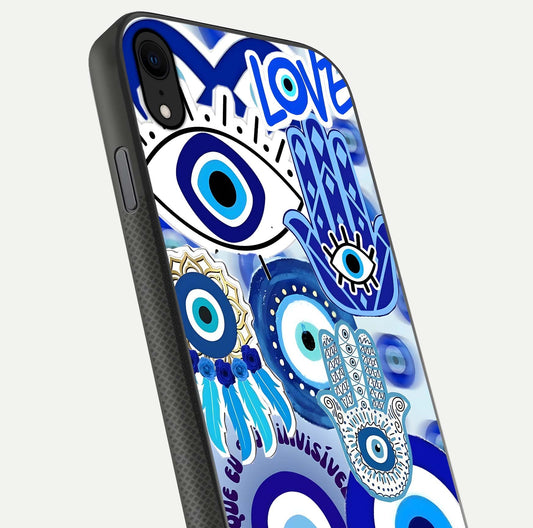 Evil Eyes Dream Glass Case for iPhone X close-up highlighting evil-eye charm detail and light reflection on glass