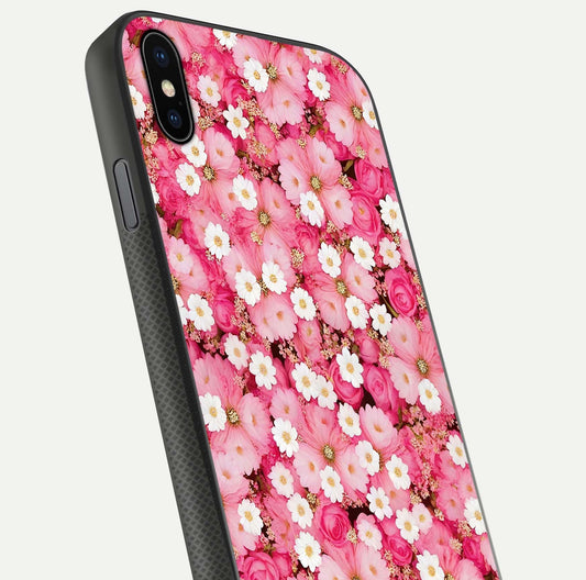 Pink Daisy Bliss Glass Case for iPhone Xs close-up angled shot highlighting daisy detail and reflection glow