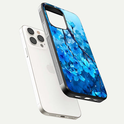 Blue Blossoms Branch Glass Case for iPhone 15 Pro Max floating mockup showing shine, curved edges, and branch detailing
