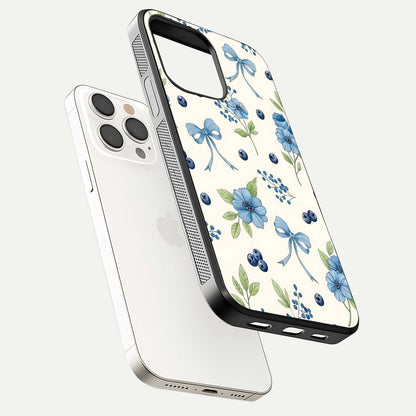 Blue Flower & Bow Glass Case for iPhone 15 Pro Max floating mockup capturing gloss reflection and girly aesthetic