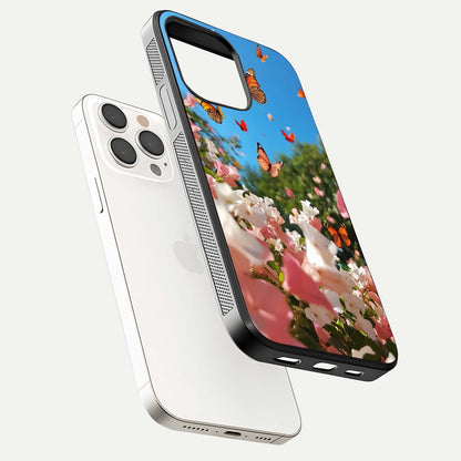Butterflies in Bloom Sky Glass Case for iPhone 15 Pro Max floating mockup capturing butterfly motion and edge design