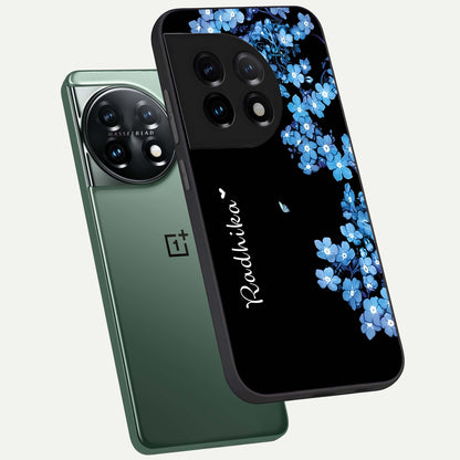  Blue Petal Dream Custom Name phone case For OnePlus 11 showing premium glass back cover with detailed artwork