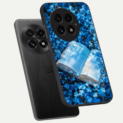  Blue Bloom Tales phone case For OnePlus 13 showing premium glass back cover with detailed artwork