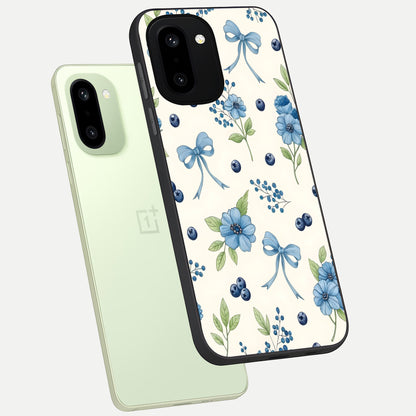  Blue Flower And Bow phone case For Oneplus 15R showing premium glass back cover with detailed artwork