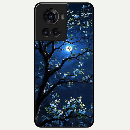Mystic Floral Night Glass Case captured at a warm angle highlighting moody floral tones, gloss, and edge clarity.