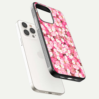 Pink Daisy Bliss Glass Case for iPhone 15 Pro Max floating dual-view mockup displaying gloss shine and pastel tones