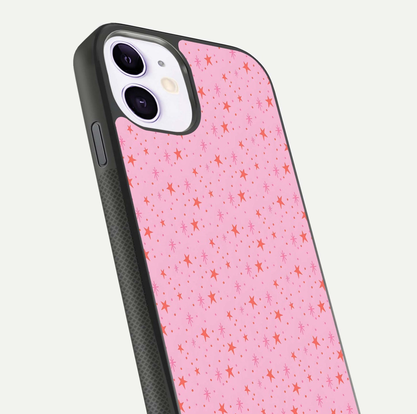 Cosmic Pink Sparkle iPhone 11 glass phone case angled back view highlighting sparkling galaxy design and textured side grip