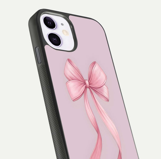 Soft Blush Bow iPhone 11 glass phone case angled back view highlighting bow artwork and side grip texture