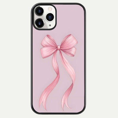 Soft Blush Bow iPhone 11 Pro glass phone case front view showcasing soft blush tones with elegant bow design