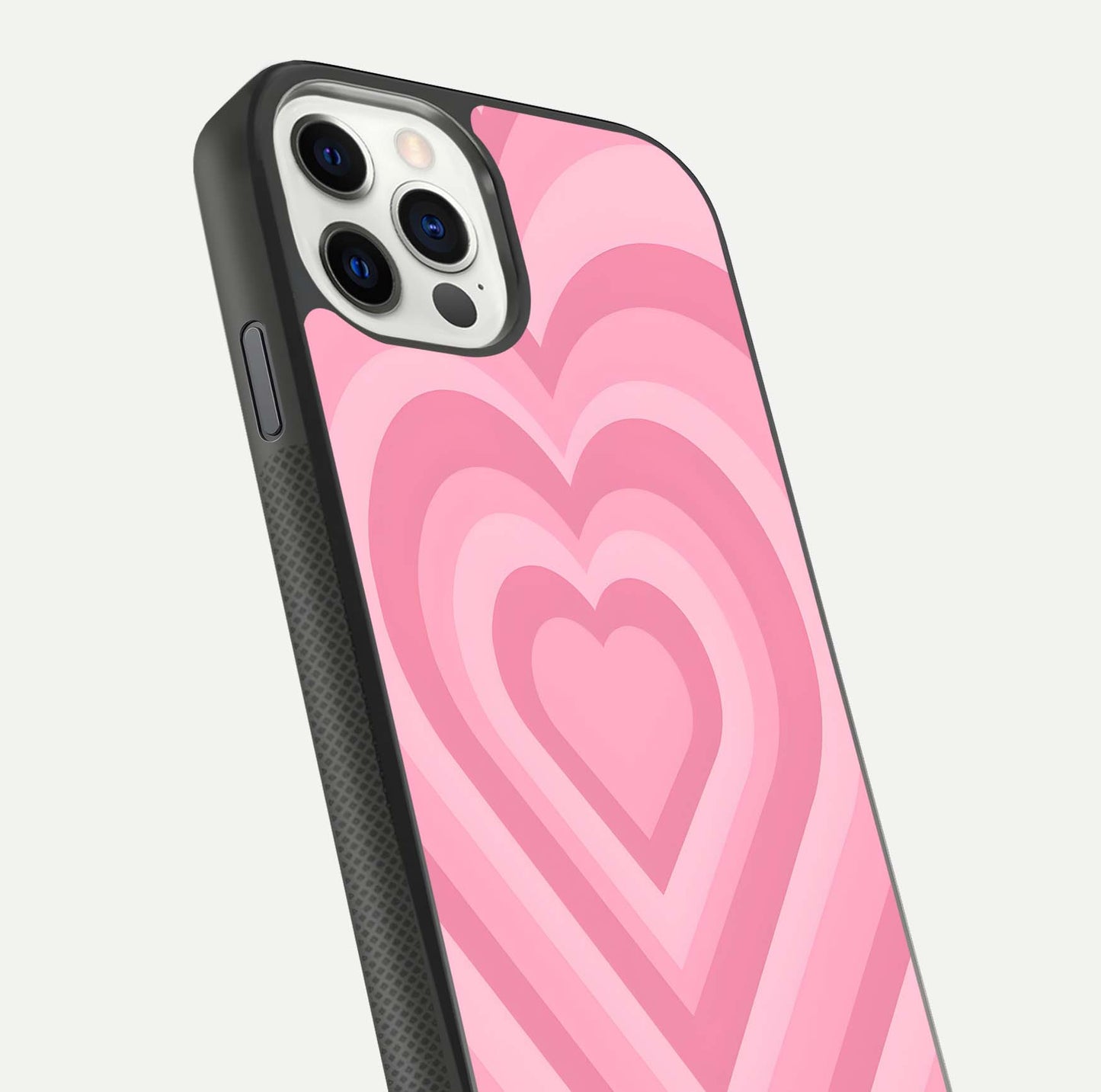 Blush Heart Waves iPhone 11 Pro glass phone case angled back view highlighting romantic heart wave artwork and grip texture