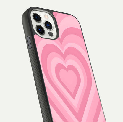 Blush Heart Waves iPhone 11 Pro glass phone case angled back view highlighting romantic heart wave artwork and grip texture