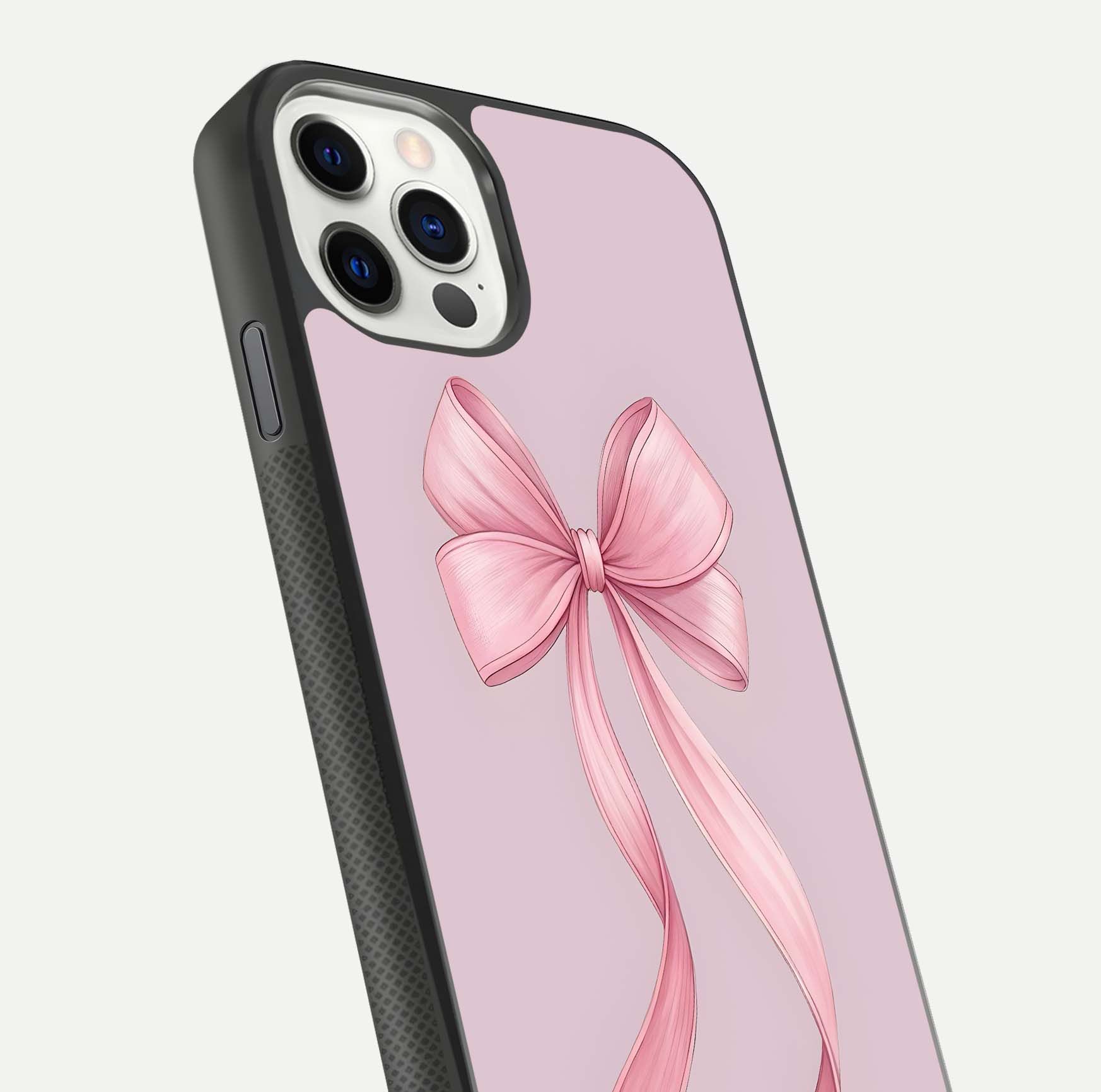 Soft Blush Bow iPhone 11 Pro glass phone case angled back view highlighting bow artwork and side grip texture