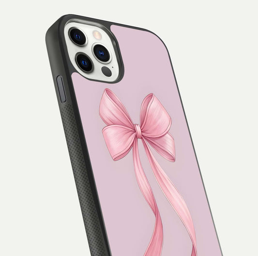 Soft Blush Bow iPhone 11 Pro glass phone case angled back view highlighting bow artwork and side grip texture