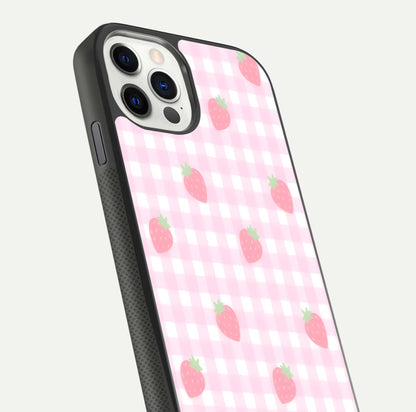 Strawberry Picnic Love iPhone 11 Pro glass phone case angled back view highlighting strawberry illustrations and textured grip