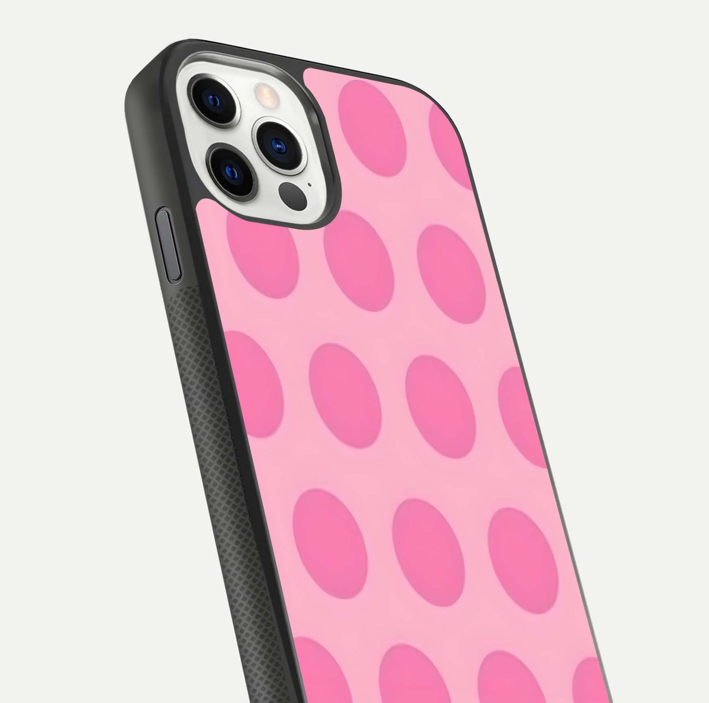 Sweet Dot Dreams iPhone 11 Pro glass phone case angled back view highlighting dotted artwork and side grip texture