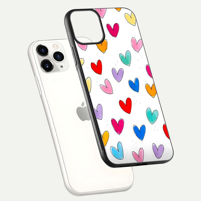 Playful Love Doodles iPhone 11 Pro glass phone case floating view emphasizing glossy finish and playful design