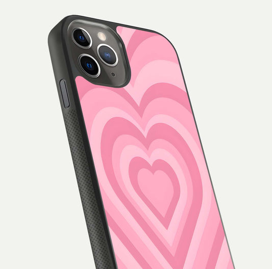 Blush Heart Waves iPhone 11 Pro Max glass phone case angled back view highlighting romantic heart wave artwork and grip texture