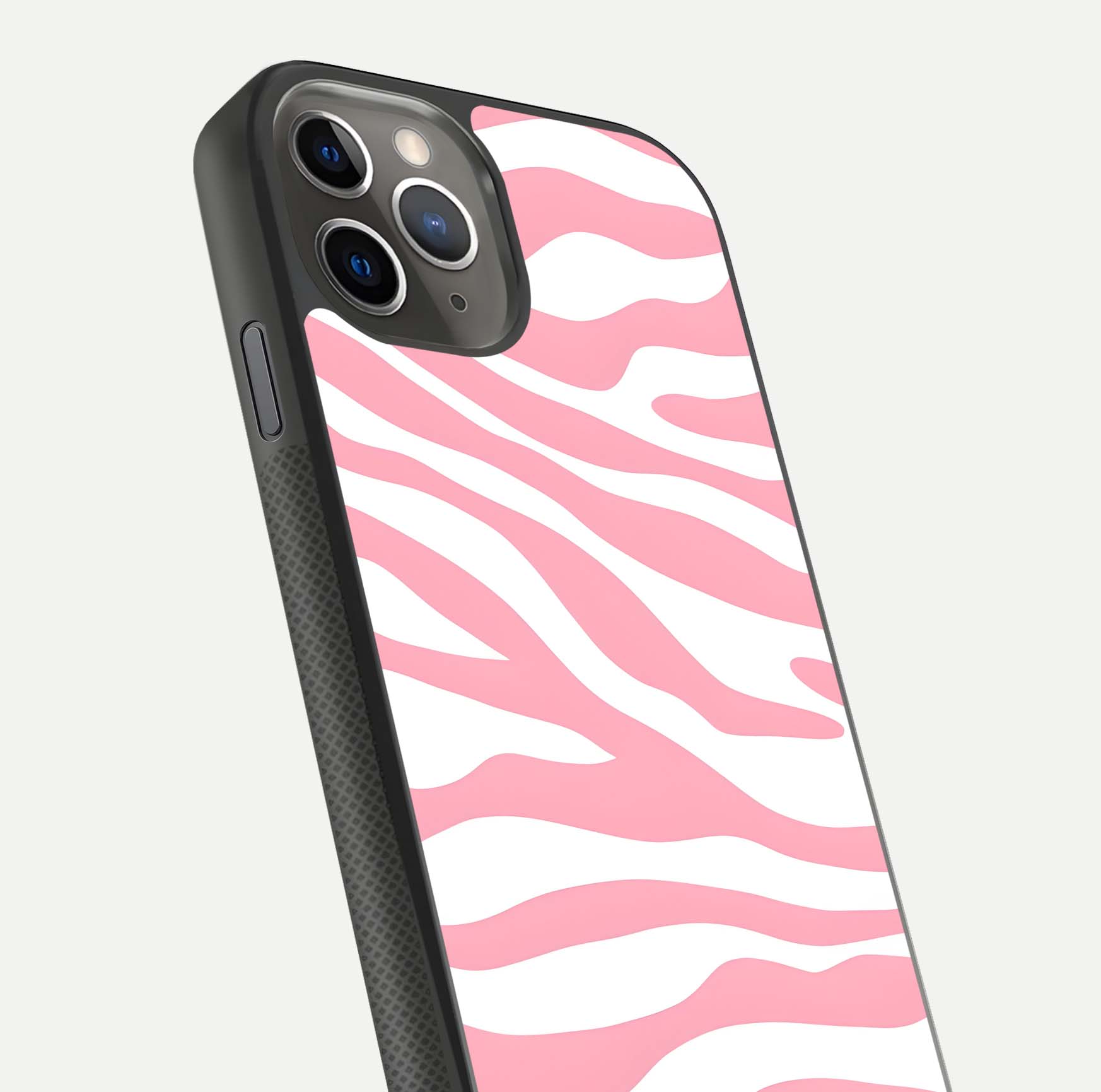 Blush Zebra Flow iPhone 11 Pro Max glass phone case angled back view highlighting bold zebra artwork and textured side grip