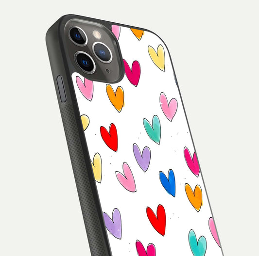Playful Love Doodles iPhone 11 Pro Max glass phone case angled back view highlighting doodle artwork and textured grip edges