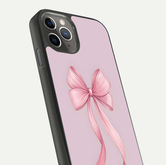 Soft Blush Bow iPhone 11 Pro Max glass phone case angled back view highlighting bow artwork and side grip texture