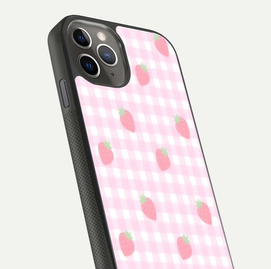 Strawberry Picnic Love iPhone 11 Pro Max glass phone case angled back view highlighting strawberry illustrations and textured grip