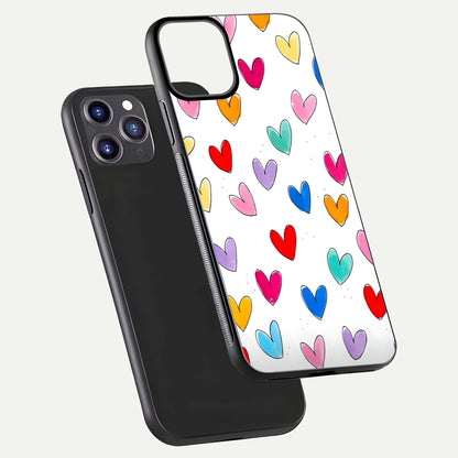 Playful Love Doodles iPhone 11 Pro Max glass phone case floating view emphasizing glossy finish and playful design