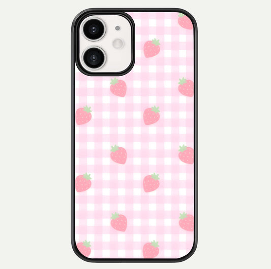 Strawberry Picnic Love iPhone 12 glass phone case front view featuring cute strawberry picnic artwork with romantic vibe