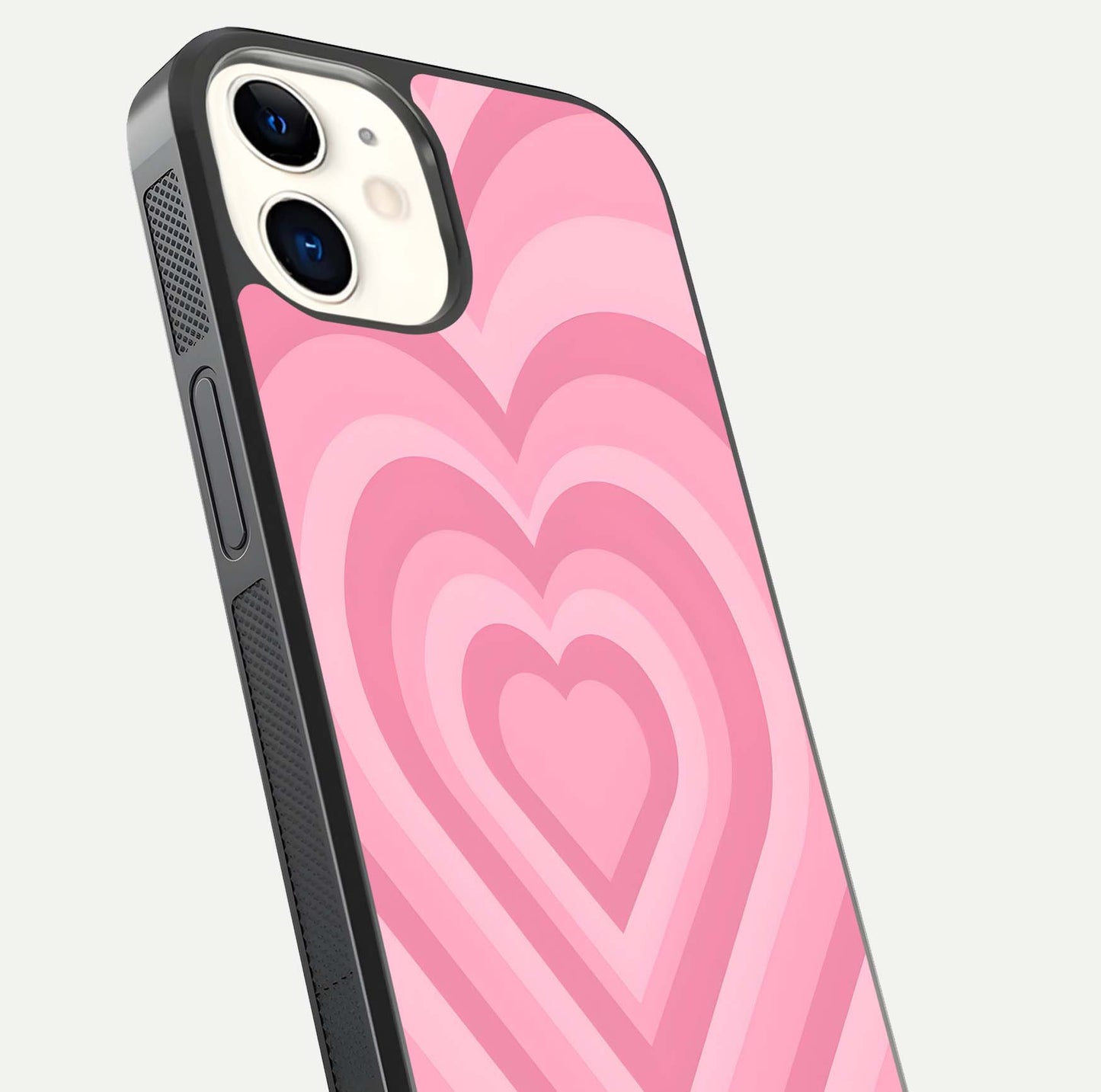 Blush Heart Waves iPhone 12 glass phone case angled back view highlighting romantic heart wave artwork and grip texture