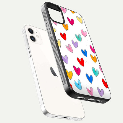 Playful Love Doodles iPhone 12 glass phone case floating view emphasizing glossy finish and playful design