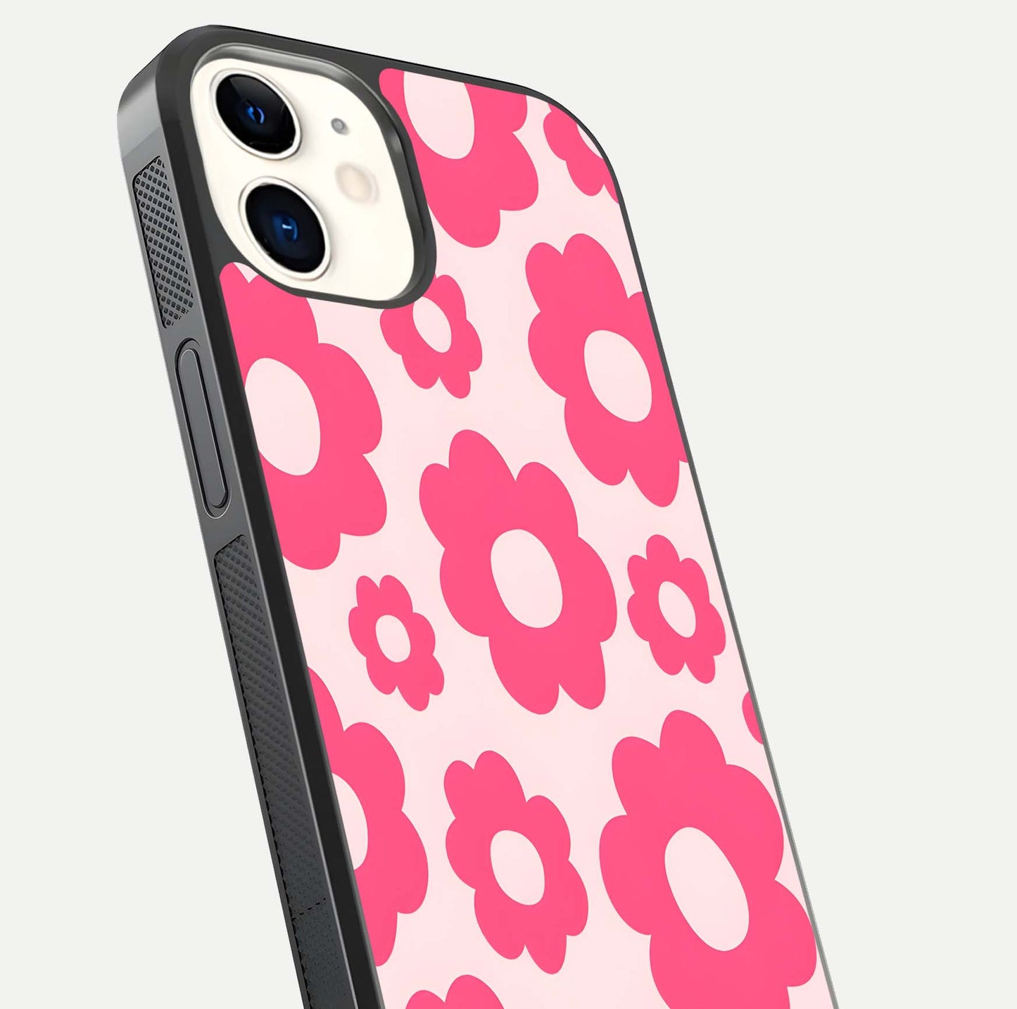 Blush Flower Pop iPhone 12 Mini glass phone case angled back view highlighting bright floral pop design and side grip texture
