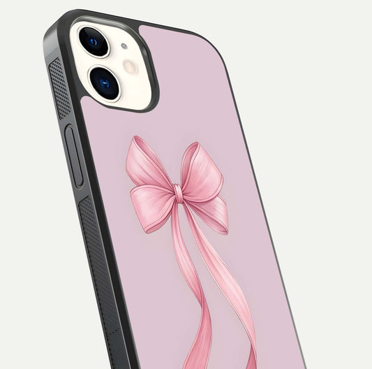 Soft Blush Bow iPhone 12 Mini glass phone case angled back view highlighting bow artwork and side grip texture