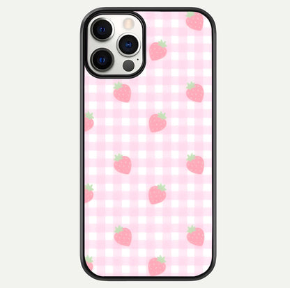 Strawberry Picnic Love iPhone 12 Pro glass phone case front view featuring cute strawberry picnic artwork with romantic vibe