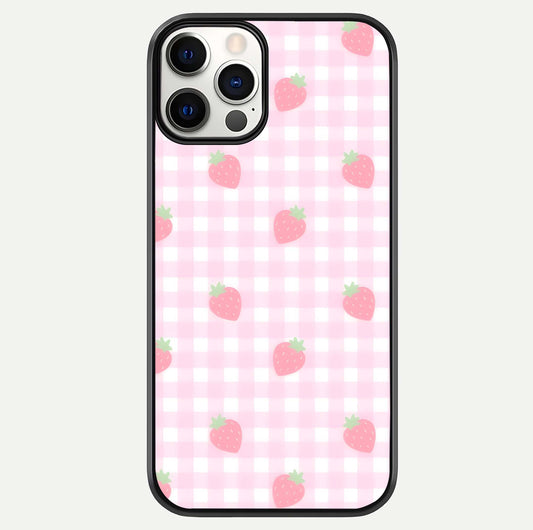Strawberry Picnic Love iPhone 12 Pro glass phone case front view featuring cute strawberry picnic artwork with romantic vibe