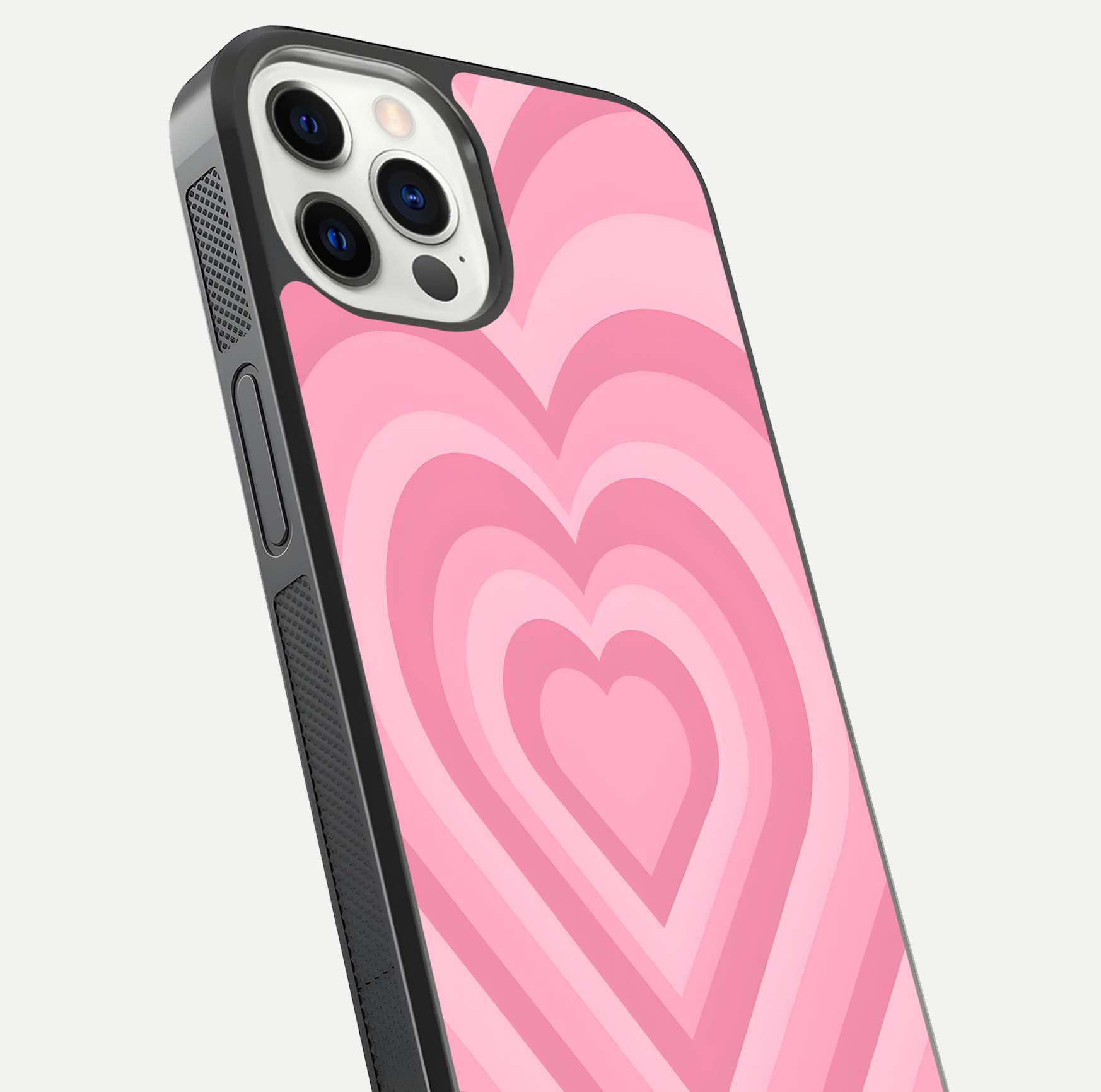 Blush Heart Waves iPhone 12 Pro glass phone case angled back view highlighting romantic heart wave artwork and grip texture