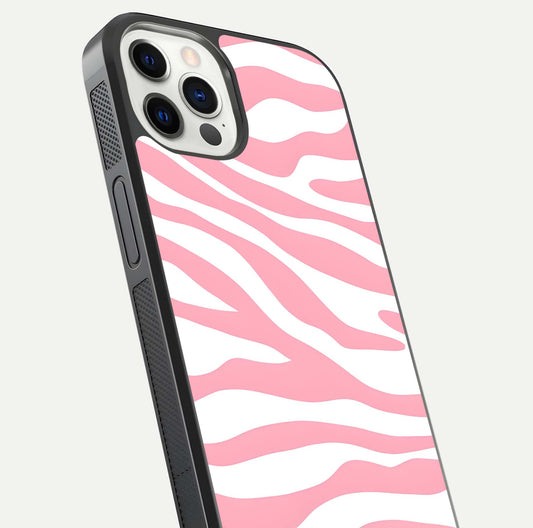 Blush Zebra Flow iPhone 12 Pro glass phone case angled back view highlighting bold zebra artwork and textured side grip